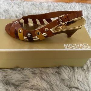 Michael Kors leather sandals.